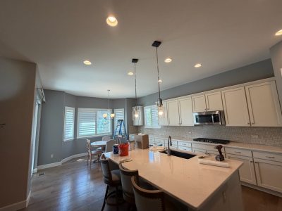 home kitchen with blue painted walls and white trim
