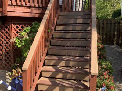 mahogany colored wooden stairway