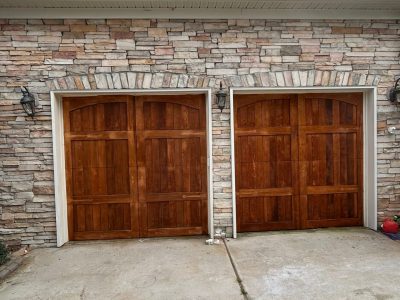 stained wooden barn-style garage doors