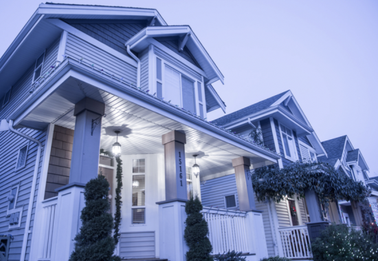 Blue sided condominium with white trim in Hanover, MA