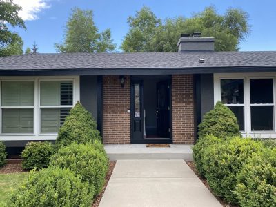 front exterior of house with repainted entryway
