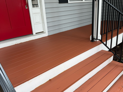 red stained front steps