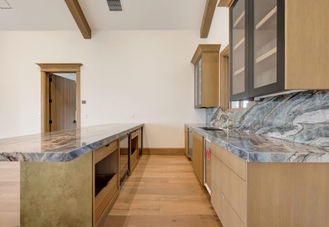 Brown Kitchen With Stone Countertops
