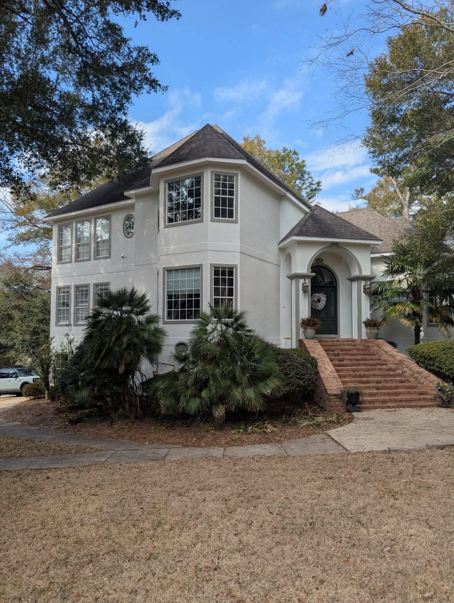 house with white painted stucco exterior