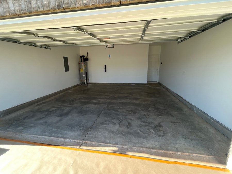 empty home garage with ground concrete floor before coating Preview Image 4