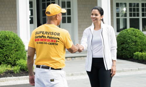 certapro employee and customer shaking hands after painting project