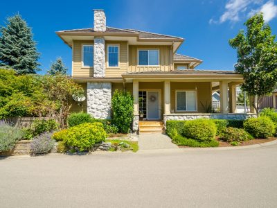 Broadmoor home after professional stucco repair and exterior repainting