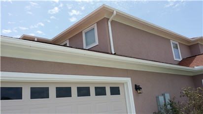 Stucco, wood, we paint it all...