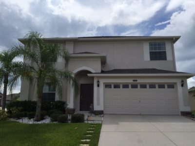 Exterior house painting by CertaPro painters in Gotha, FL