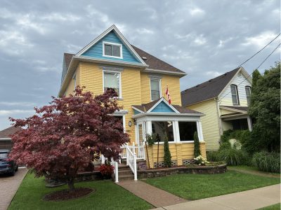 St Thomas Historical Property Painting with Yellow and Blue Exterior