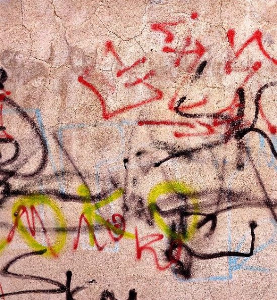graffiti on wall needing removal