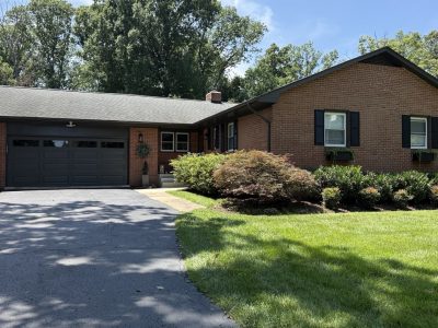 home exterior after siding and trim repaint