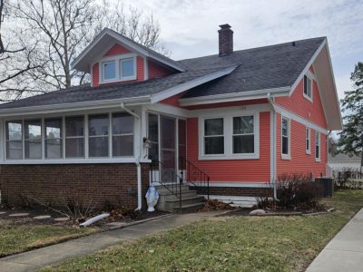 house with pink painted siding