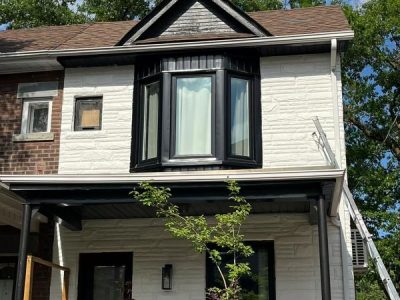 front view of brick painting house