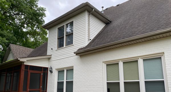 Rear view of brick home