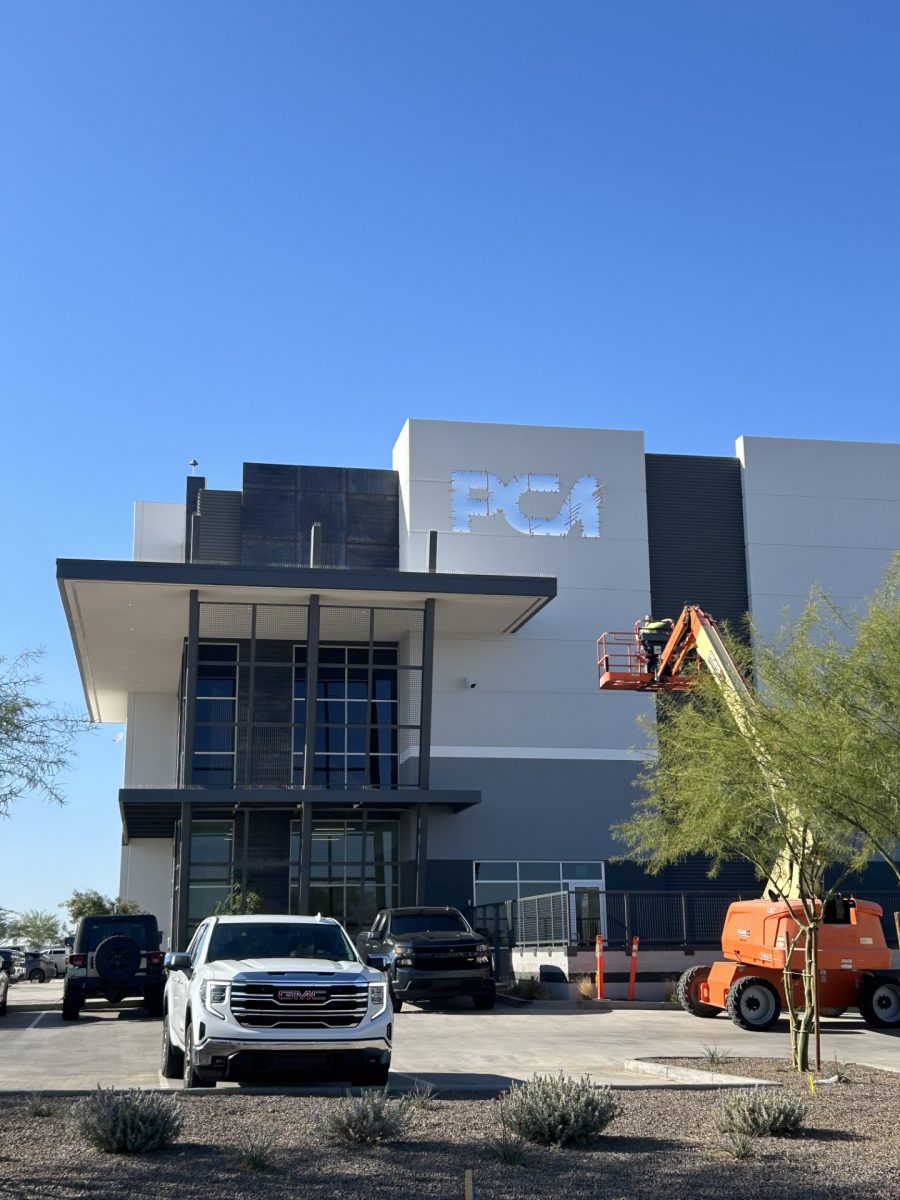 white and commercial building during logo painting project Preview Image 4