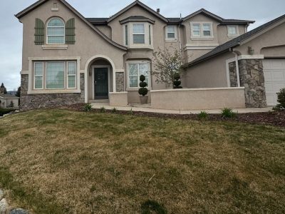 stucco house exterior after repaint