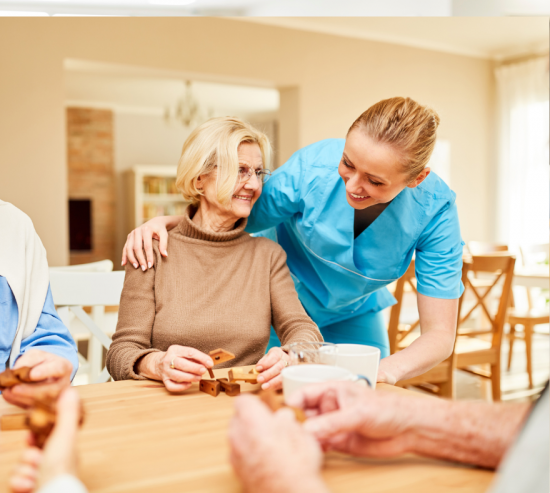 nurse with senior care patient in senior care facility