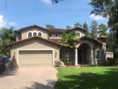 Exterior house painting by CertaPro painters in Ocoee, FL