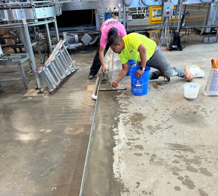 Pilot Project Brewing Photo during smoothing concrete over repaired floor Preview Image 4