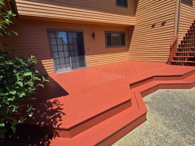 red stained wooden deck