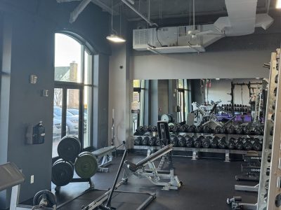 painted free weights are in gym