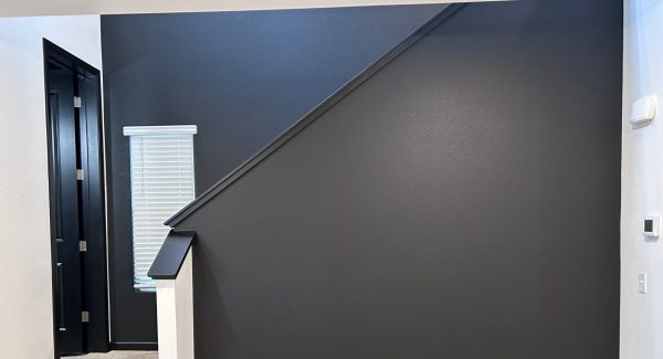 black painted home stairway wall