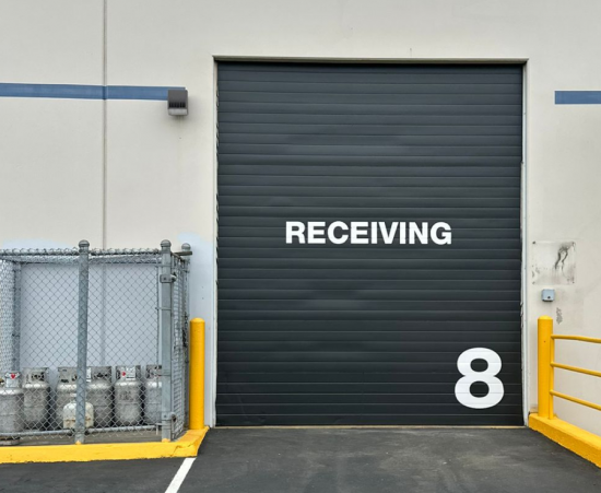 Warehouse Door Painting + Stenciling