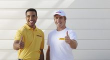 Two CertaPro employees giving a thumbs up